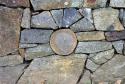 This is a small part of an old rock wall on the grounds of Maudsley State Park in Newburyport, Massachusetts.