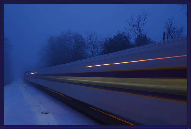 The Boston-bound train lumbering past me through the fog. This is about a 2 second exposure.