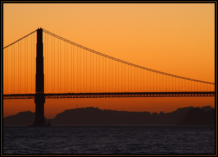 The Golden Gate Bridge in San Francisco, California at sunset.