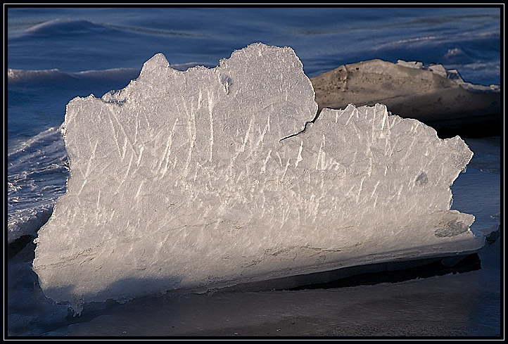 Ice in the salt marsh in Newbury, Massachusetts (US). The tide constantly raises and lowers the water level in the marsh. This causes the ice to break up and refreeze. This piece of ice is 3-4 feet tall.