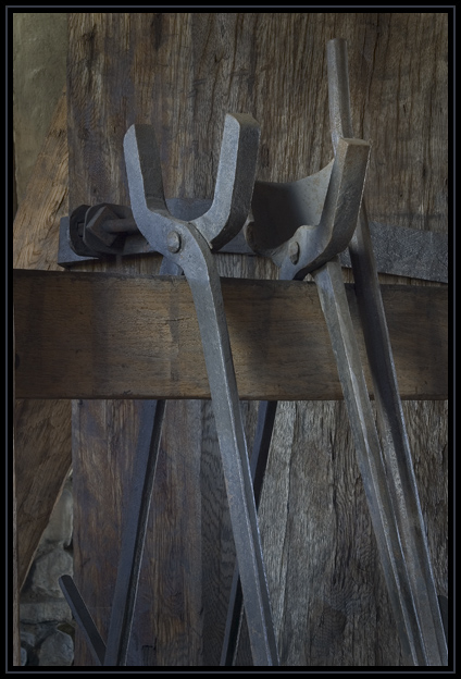 These are replicas of tools used in the Saugus Iron Works, the oldest successful iron works in North America. The Iron Works was in production from 1646-1668. These tools were located in the Forge building. 