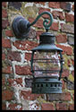 An antique lamp on an historic farm house in Newburyport, Massachusetts (US).